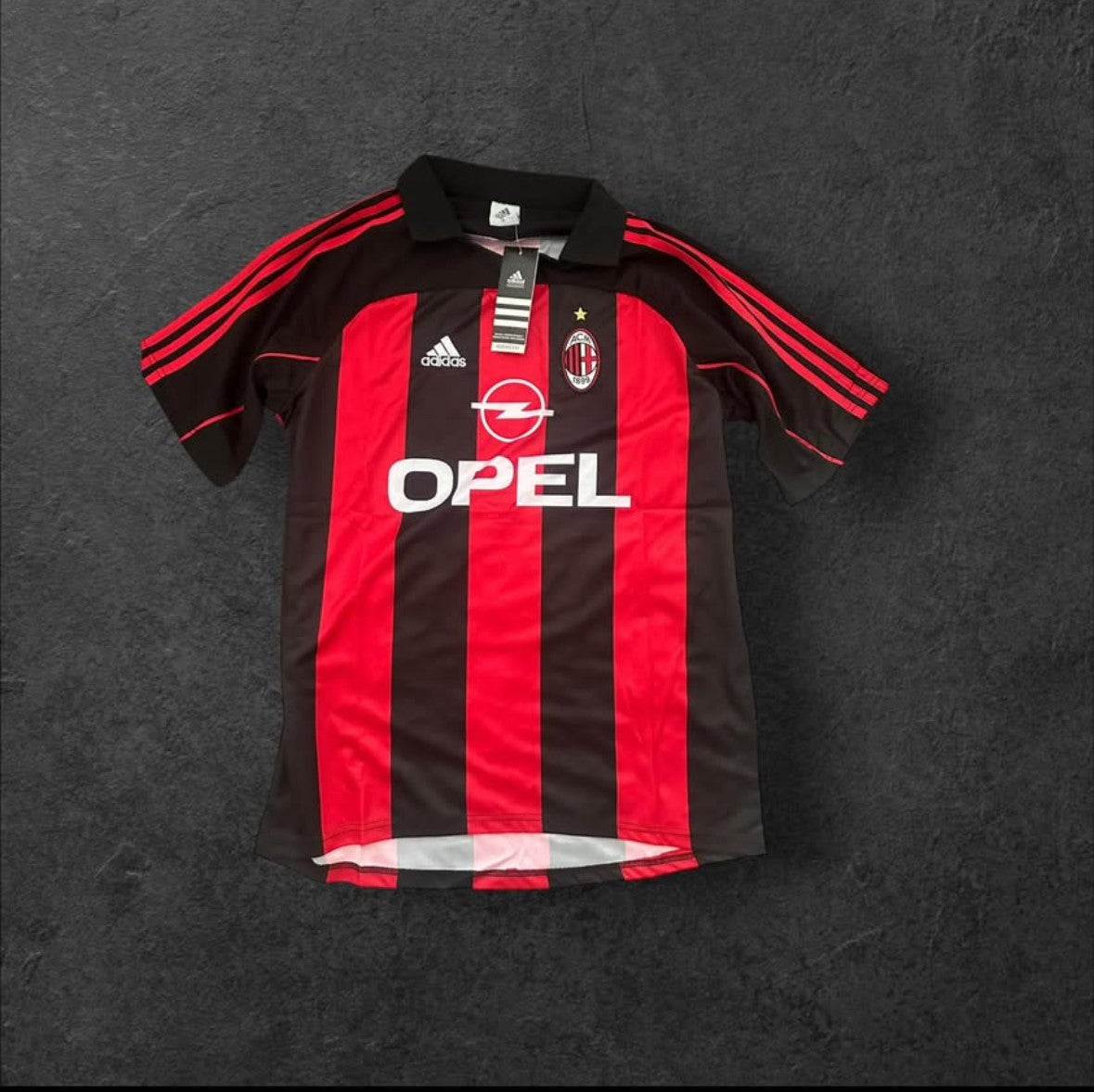 AC Milan Home 2000-02 Jersey with iconic Opel logo and classic red and black stripes.