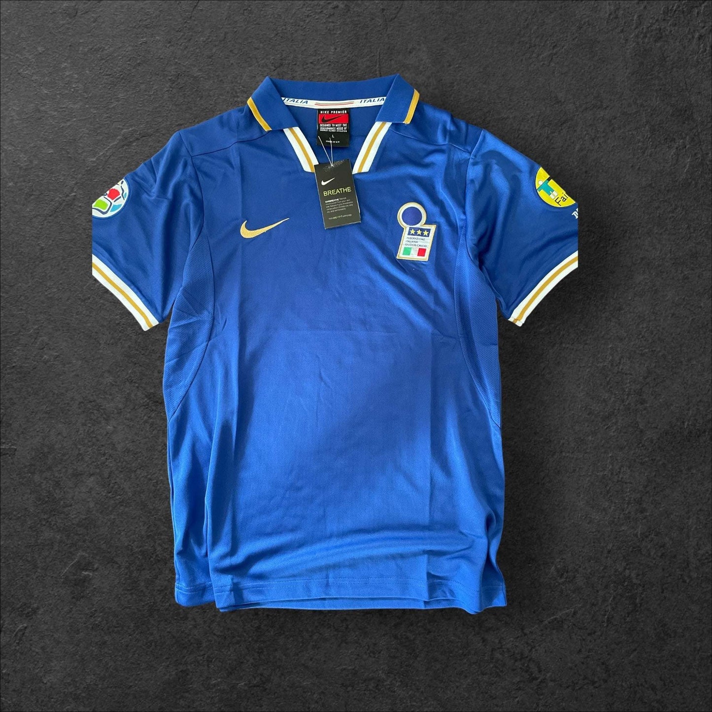 Italy Home 1996 Retro Soccer Jersey, deep blue with white and red accents, featuring Italian football heritage design.