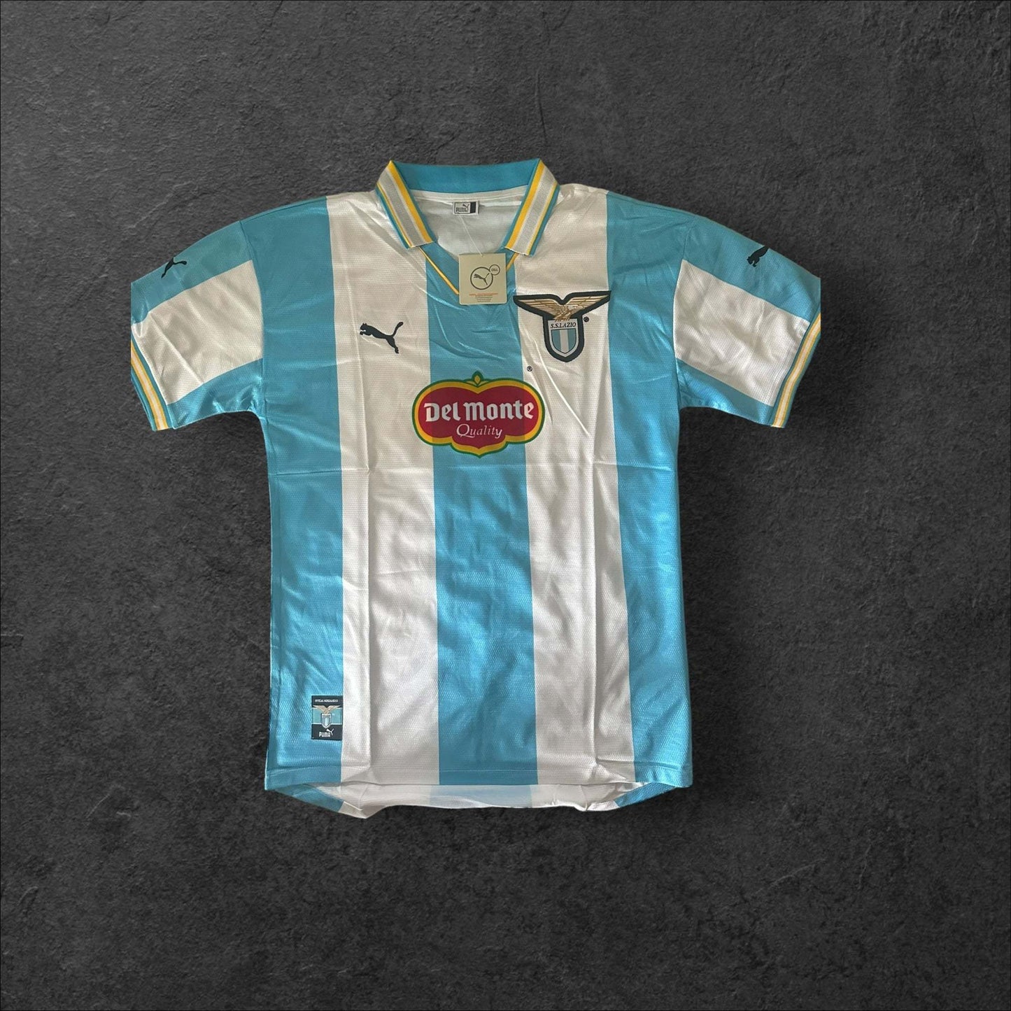 Lazio Home 2000-01 jersey with light blue color and Del Monte sponsorship.