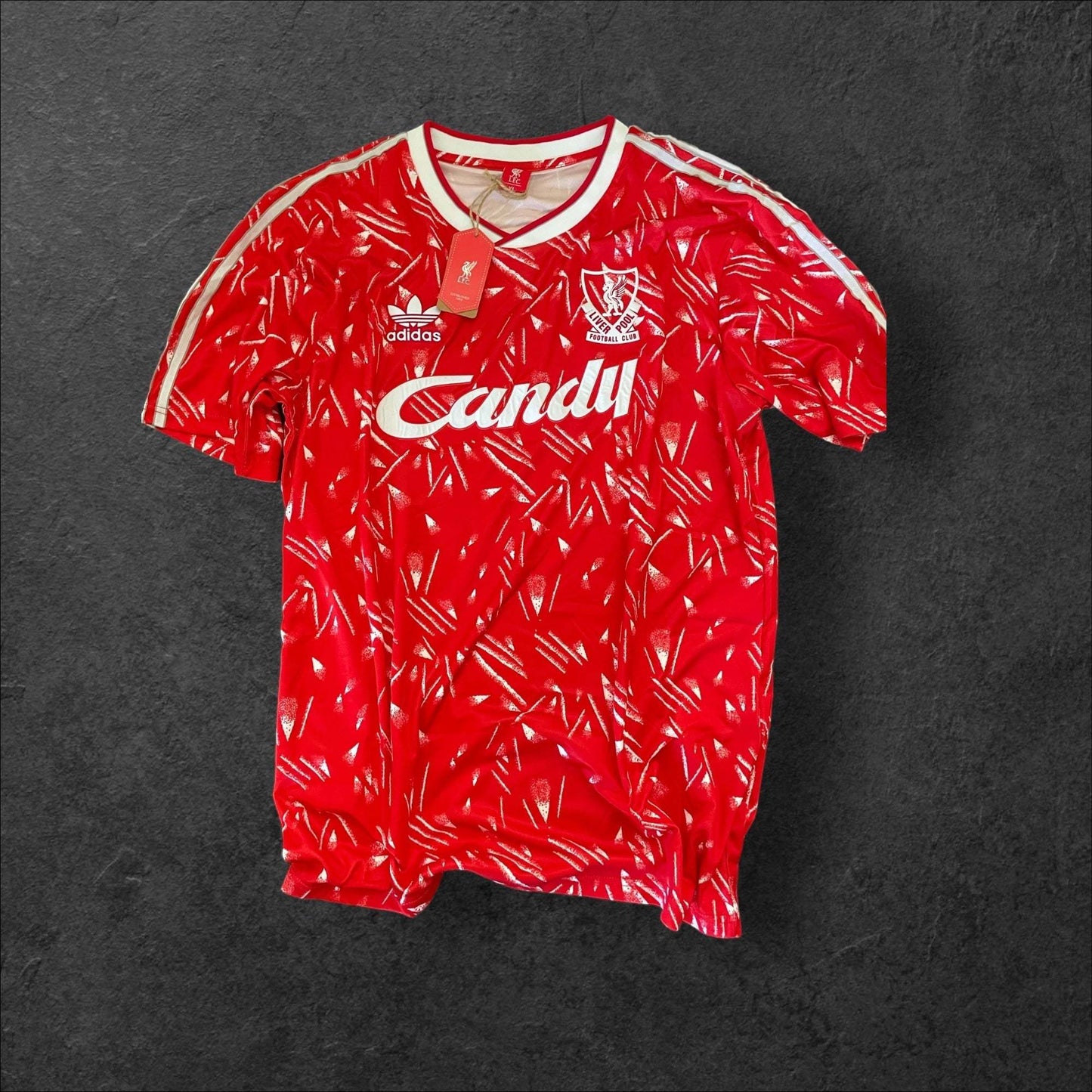 Liverpool Home 1989-91 Jersey featuring vibrant red color and iconic Candy logo.