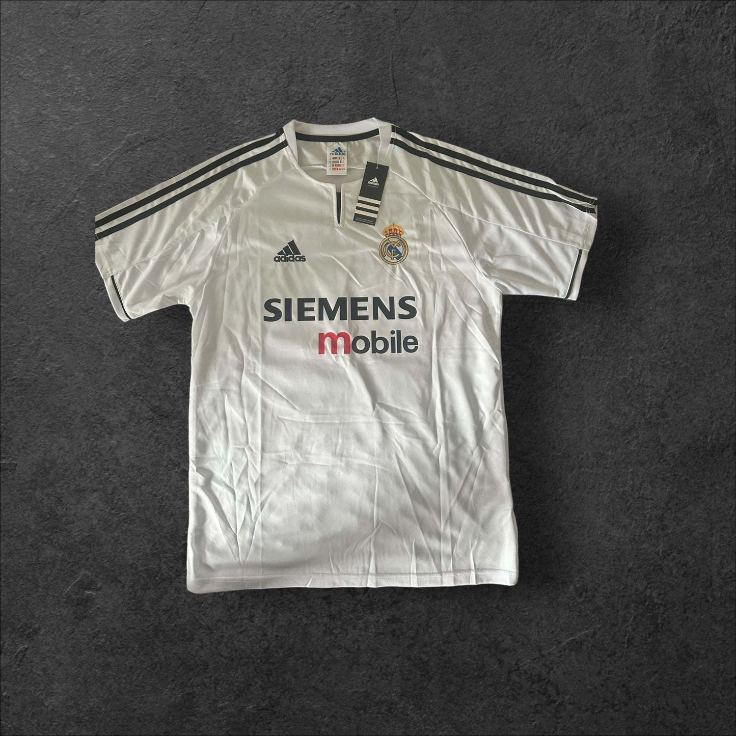 Real Madrid Home 2002-03 jersey with classic white design, Adidas stripes, and club crest.