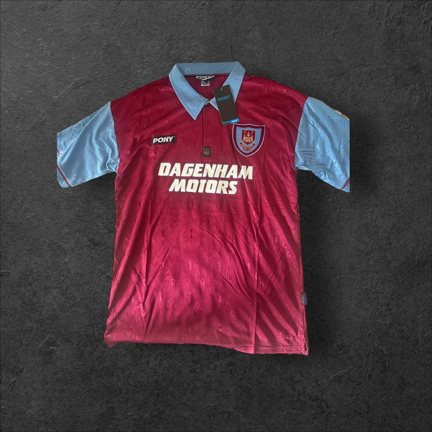 West Ham Home 1995-97 football jersey featuring Dagenham Motors logo in claret and blue colors.