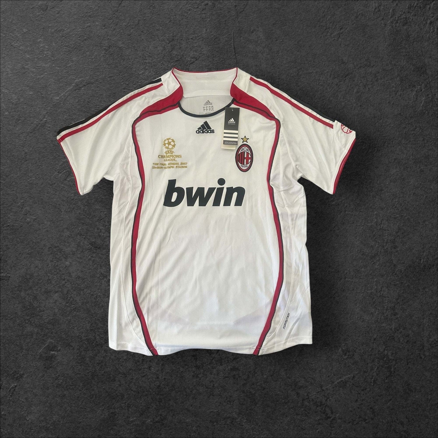 AC Milan Away 2006-07 jersey featuring iconic design worn by Kaka, commemorating Champions League victory.