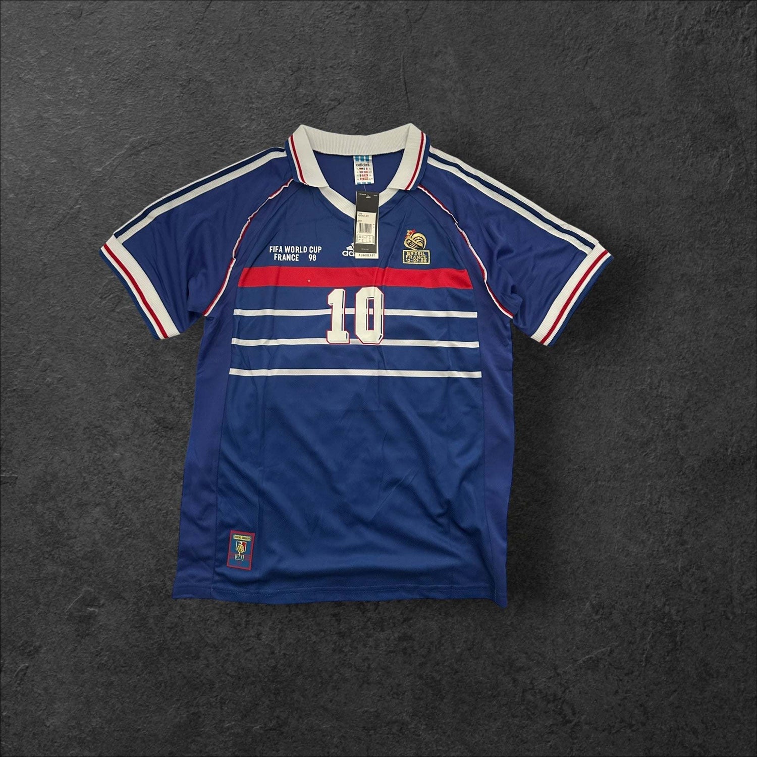 France Home 1998 Retro Soccer Jersey featuring deep blue design with red and white accents, celebrating the 1998 FIFA World Cup victory.